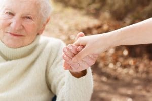 holding hand in park